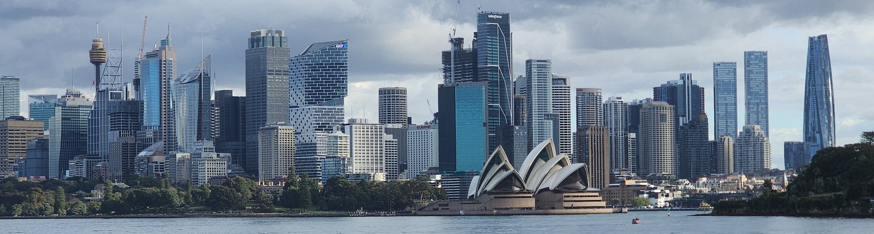 Sydney skyline and the Opera House seen across the harbour